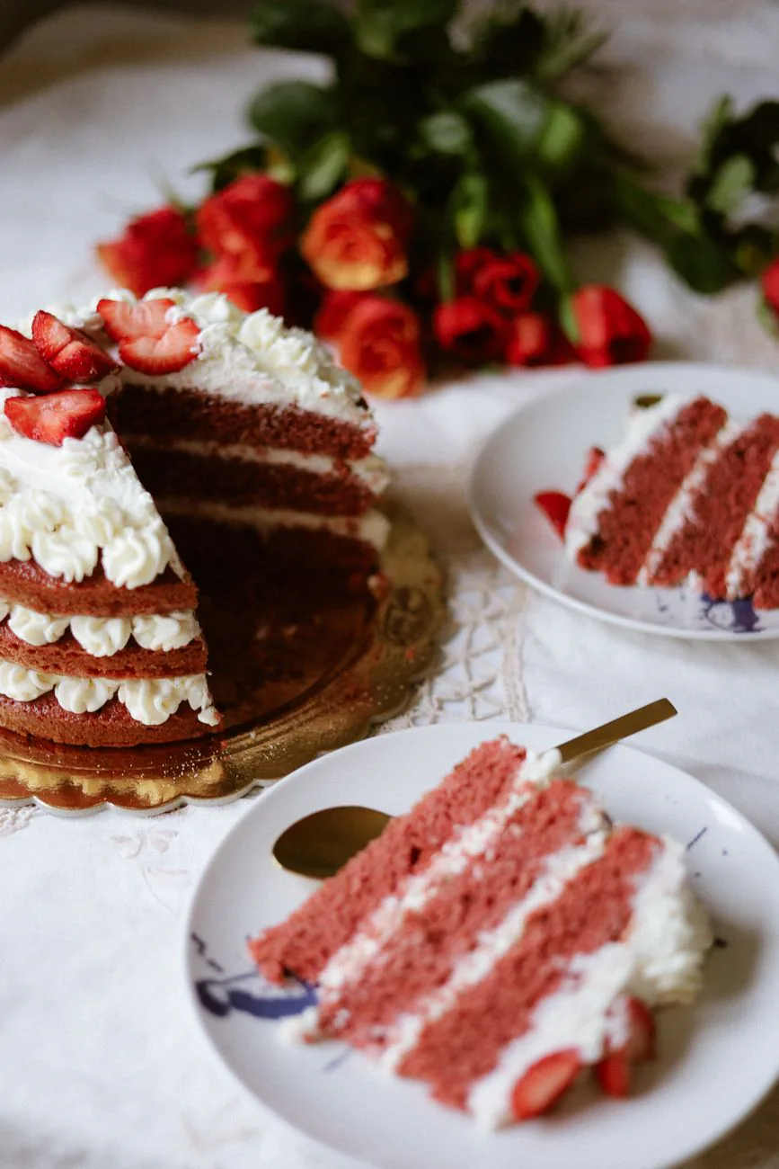 Strawberry layer cake with fresh cream and strawberries